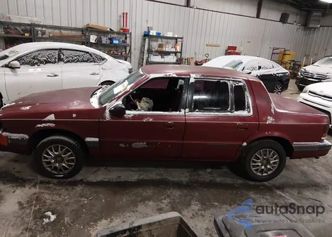 1990 Dodge Spirit z USA, uszkodzony, nr VIN 1B3XA46K0LF742798